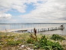 På Fuglsø strand är det skönt att bara sitta på bryggan och koppla av