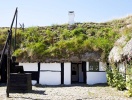 Museumsgården är ett friluftsmuseum inrett i en ursprunglig fyrlängad tånggård