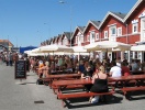 De oprindelige røde pakhuse på havnen rummer i dag Skagens bedste fiskerestauranter