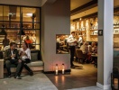 Om aftenen kan I også nyde en cocktail i hotellets elegante Schneiders Bar