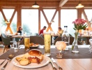 Nyd søudsigten fra BEECH Resort Plauer Sees restaurant