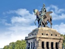 Se det imponerende monument til kejser Wilhelm I på næsset, hvor floderne mødes