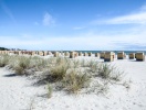 Oplev Lübeckbugtens smukke kyststrækning og havets bølgebrus året rundt