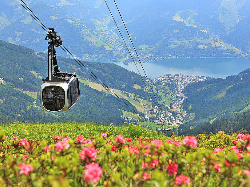 Sväva med linbanan upp i höjden över Zell am See-Kaprun och få de mest praktfulla panoramavyerna