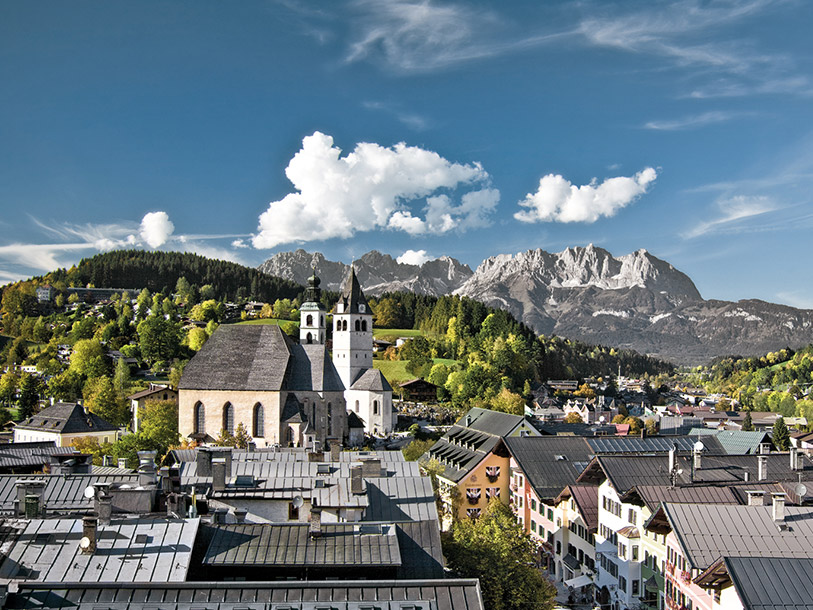 Besøg den populære ferieby Kitzbühel, der byder på både mondæne butikker og pittoreske alpehuse