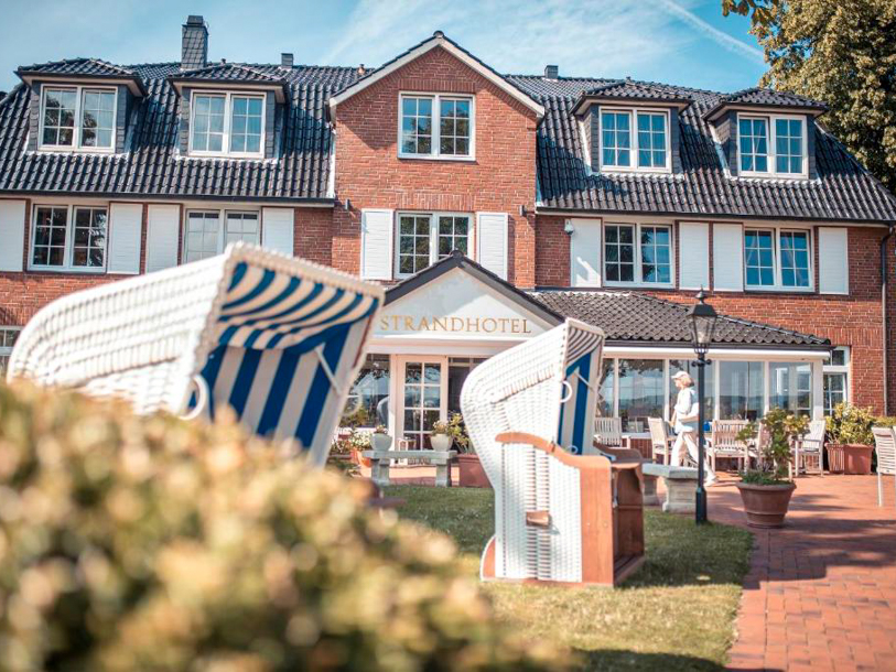 Bo på detta mysiga, familjeägda strandhotell - som erbjuder stans bästa läge på badorten Strande