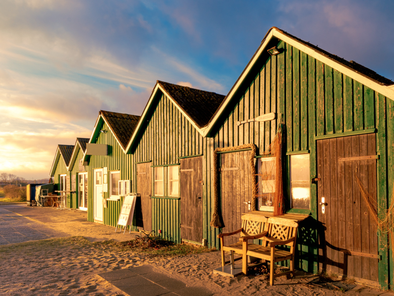 Nyd betagende solnedgange ved stranden efter jeres aktive dage på banen